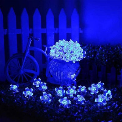 Guirlande exterieur lumineuse teintée bleu