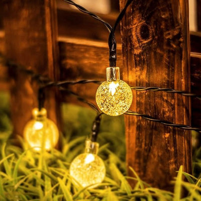 Guirlande lumineuse exterieur mini boule sur cloture